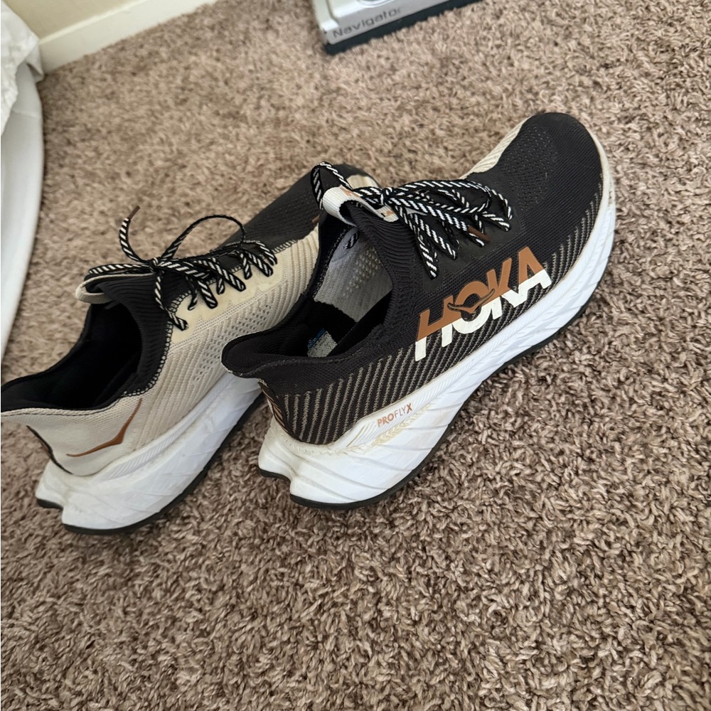 Hoka Black and Cream Athletic Shoes
